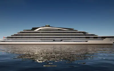 Eine futuristische mega Yacht namens ULYSSIA gleitet auf ruhigem Wasser.