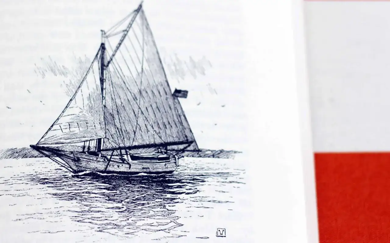 Segelboot auf dem Wasser, erinnert an die Reisen von Joshua Slocum.